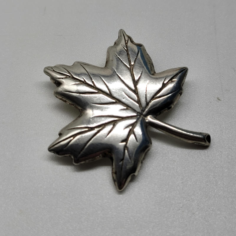 Silver Canadian Maple Leaf Brooch A lovely silver brooch in the form of a Canadian maple leaf. Measures 2.8 x 3.2cm Weighs 6.12g
