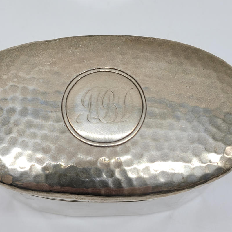 Matching Antique Art Deco Silver-topped Trinket Dishes Nice to find a matching pair of silver-topped trinket dishes as usually over time they get separated or broken. One is circular whilst the other is oval. Both are monogrammed. The oval dish has a chip which can be seen in the photos. Both are hallmarked as London 1919