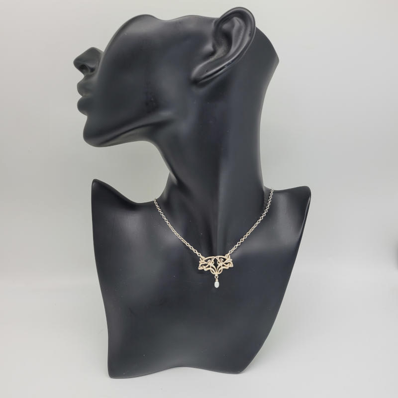 Art Nouveau Silver and Blister Pearl Necklace by Malcolm Gray An unusual art nouveau necklace made in 925 silver with a blister pearl hanging from the bottom of the pendant made by Scottish designer Malcolm Gray. Necklace measures 52cm Pendant measures 3cm x 2.6cm