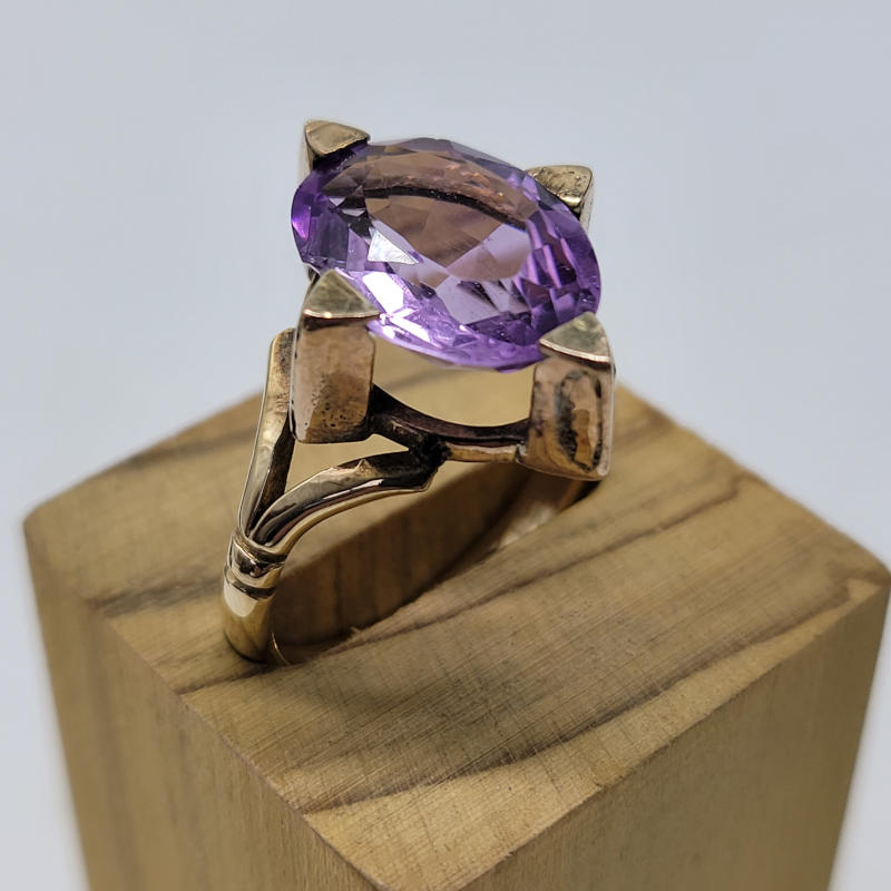 There is a slight nibble out of the one side of the amethyst but is not really noticeable to the naked eye.