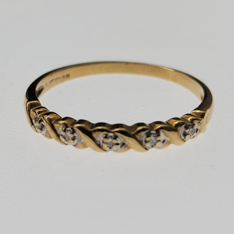 9ct Diamond Half Eternity Ring A delicate 9ct yellow gold half eternity ring with 5 small diamonds across the top of the ring. Hallmarked CJ Birmingham 2000 UK Size Q½ US Size 8½ Circumference 58.5mm