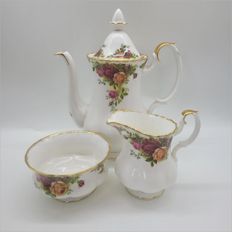 Royal Albert Country Roses Coffee Set A really large coffee set of Royal Albert Old Country Roses. Includes coffee pot, creamer/milk jug, sugar bowl, 12 coffee cups, 12 saucers and 12 side plates.